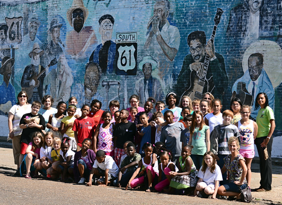 The Parks Elementary fourth grade tour group in front of one of the blues murals in Leland, Mississippi. Photo credit: Roy Meeks